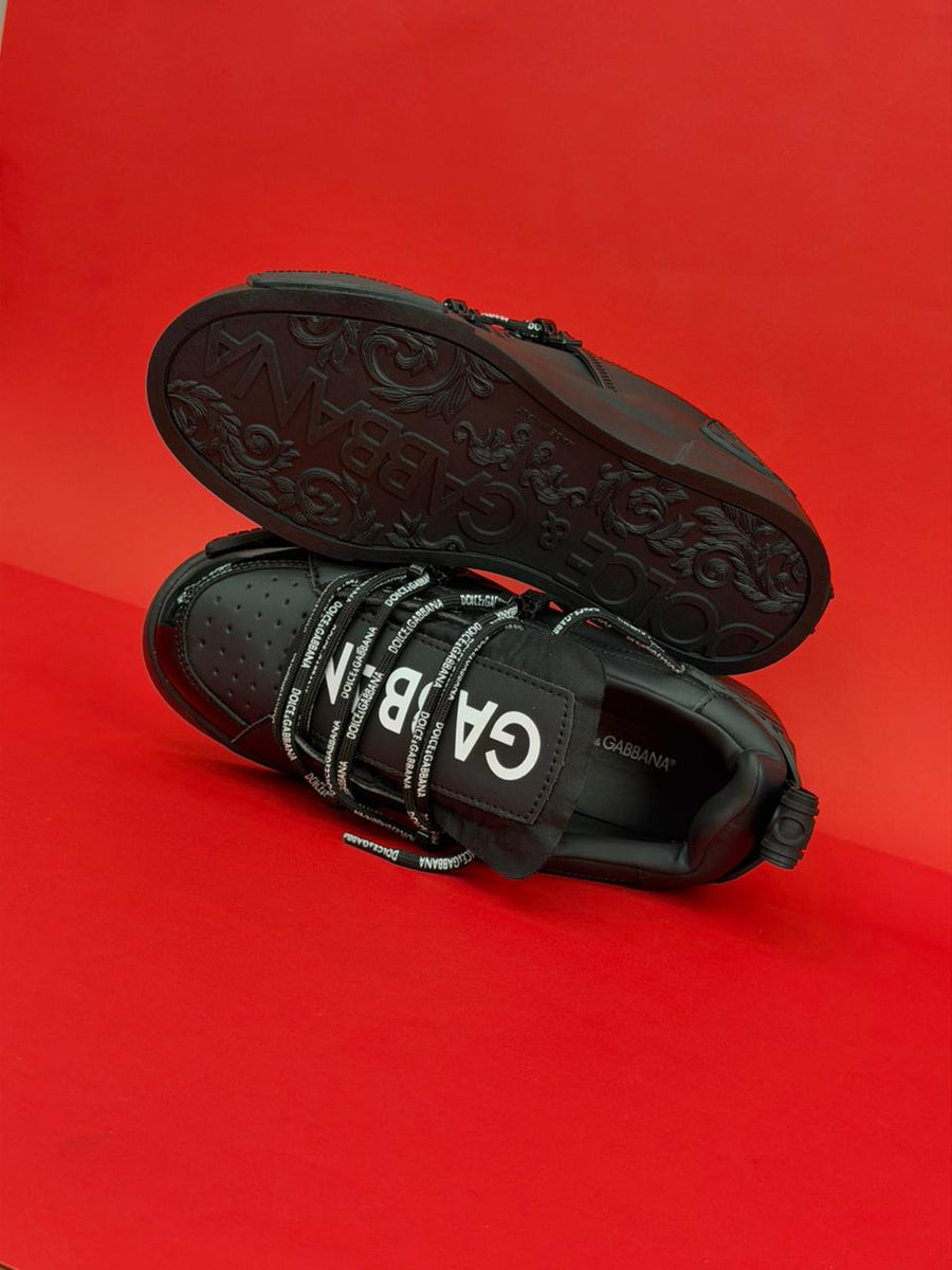 DOLCE GABBANA ZAPATILLA CORDÓN NEGRO