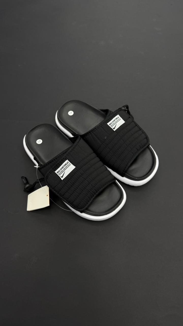 NIKE CHANCLA ASUNA NEGRO BLANCO