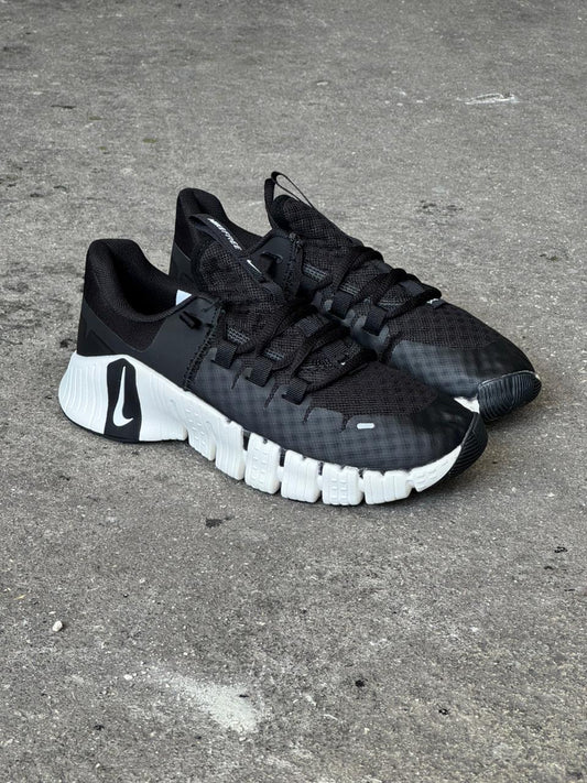 NIKE FREECOM NEGRO BLANCO