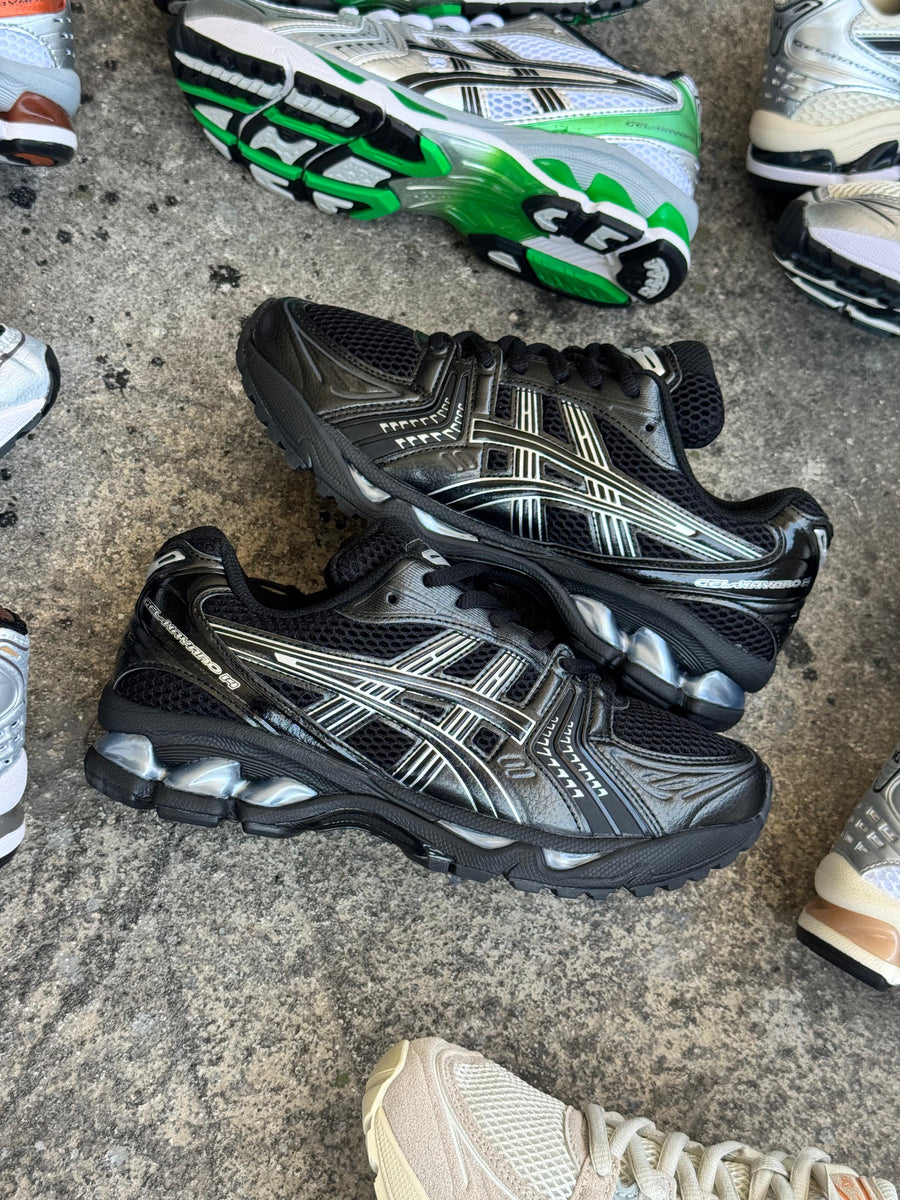 ASICS NEGRO LINEA BLANCA