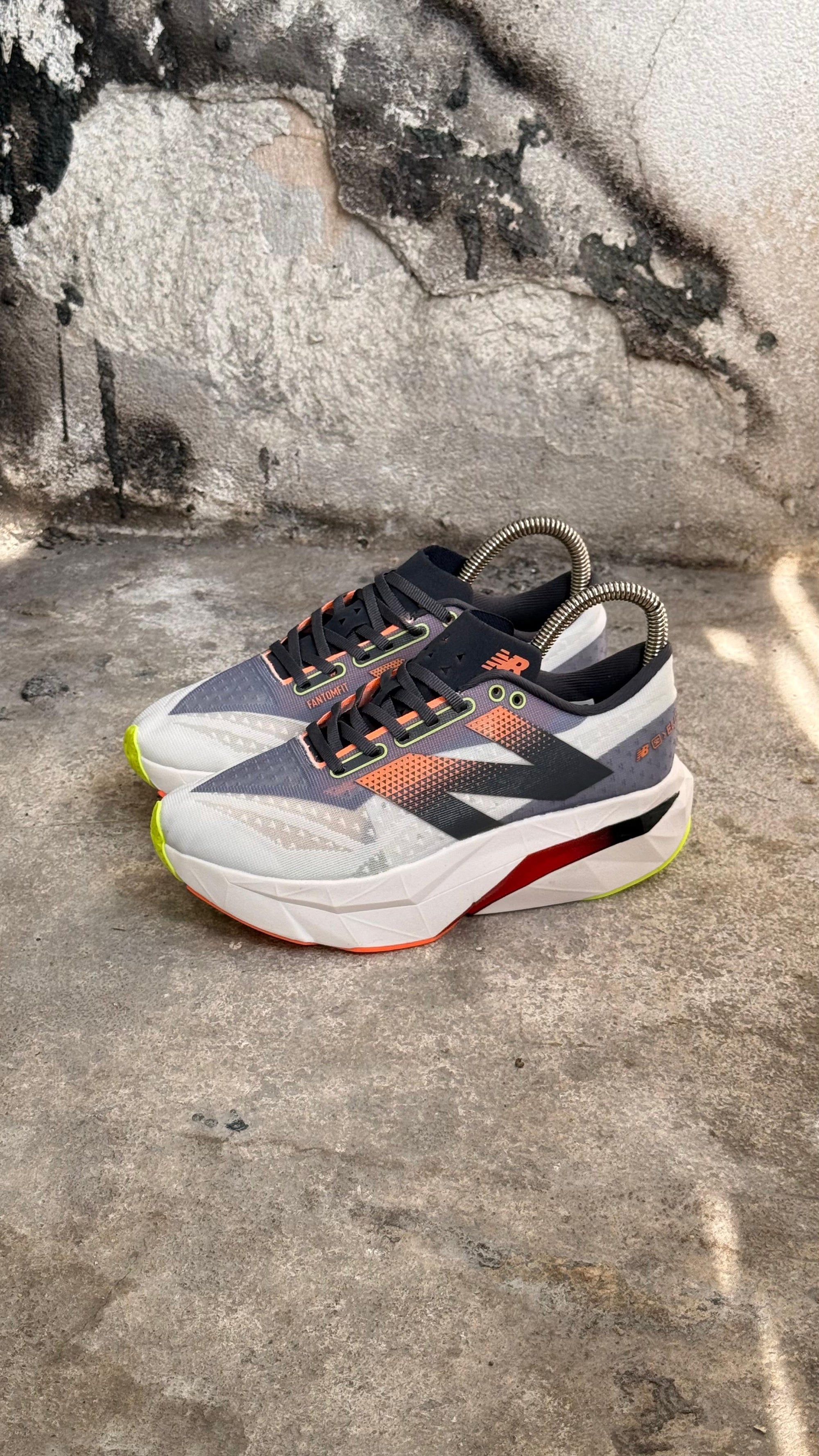 NEW BALANCE ELITE GRIS ROJO