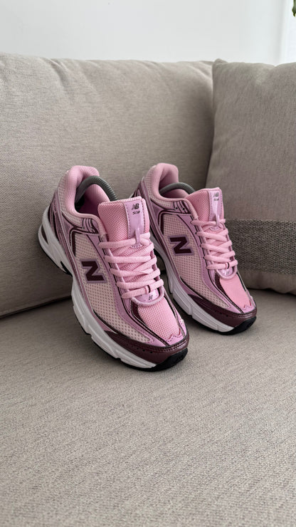 NEW BALANCE 509 ROSADO