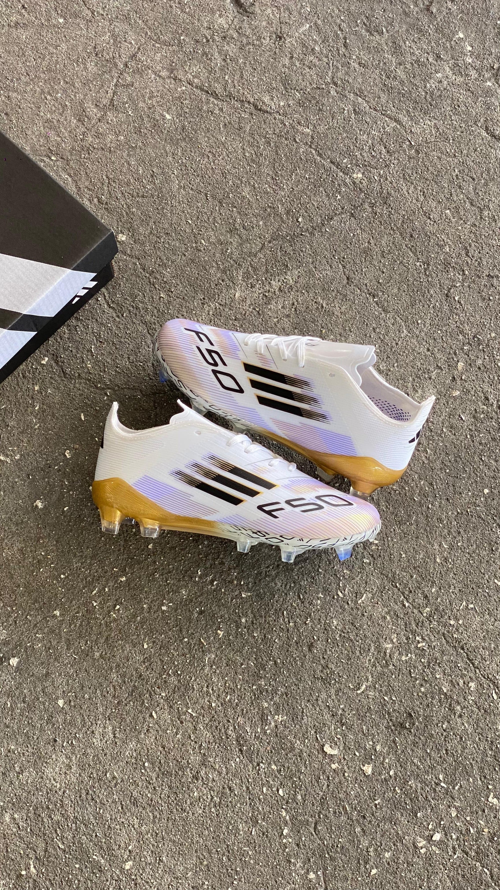 ADIDAS GUAYO F50 NIÑO DORADO