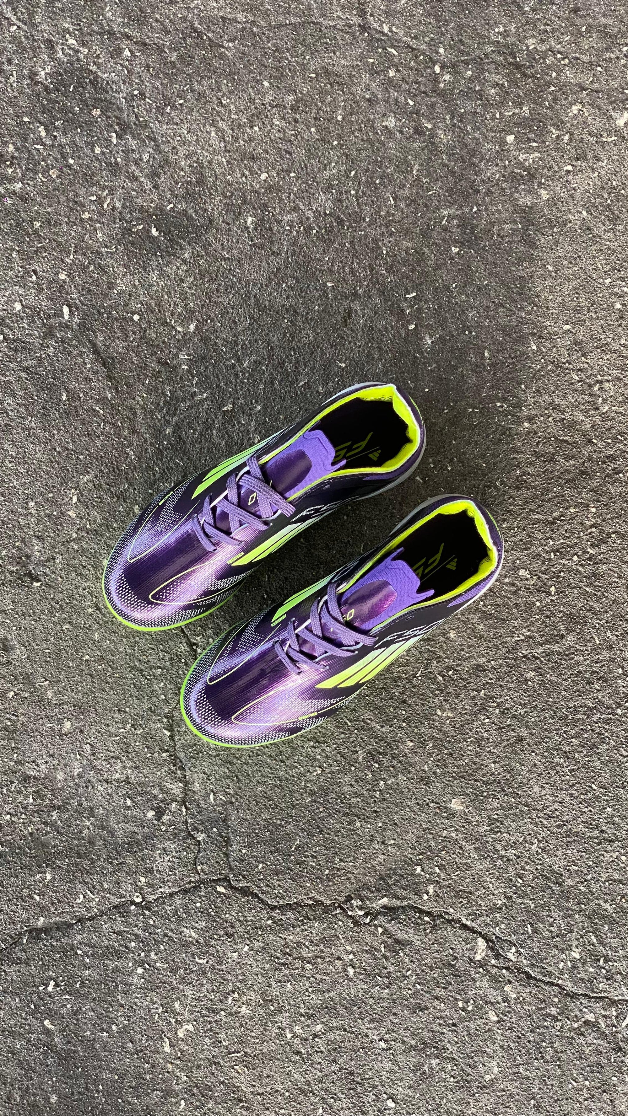 ADIDAS GUAYO F50 NIÑO NEGRO VERDE