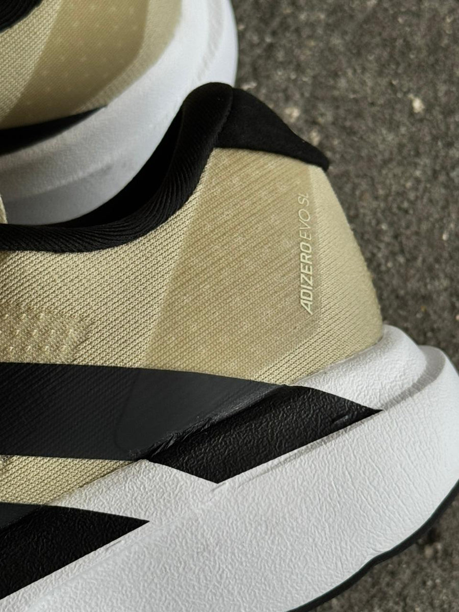 ADIZERO BEIGE NEGRO