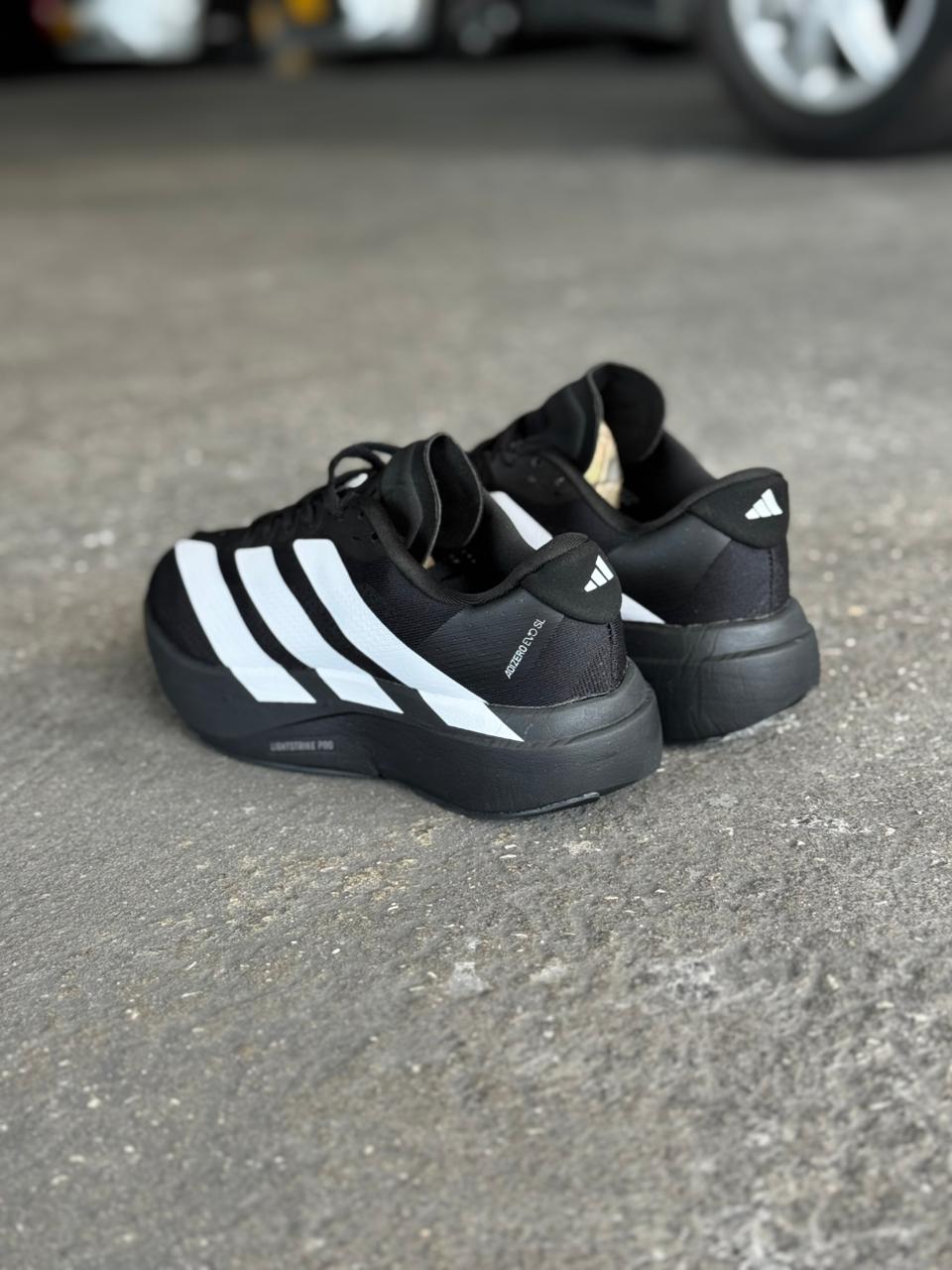 ADIZERO NEGRO BLANCO