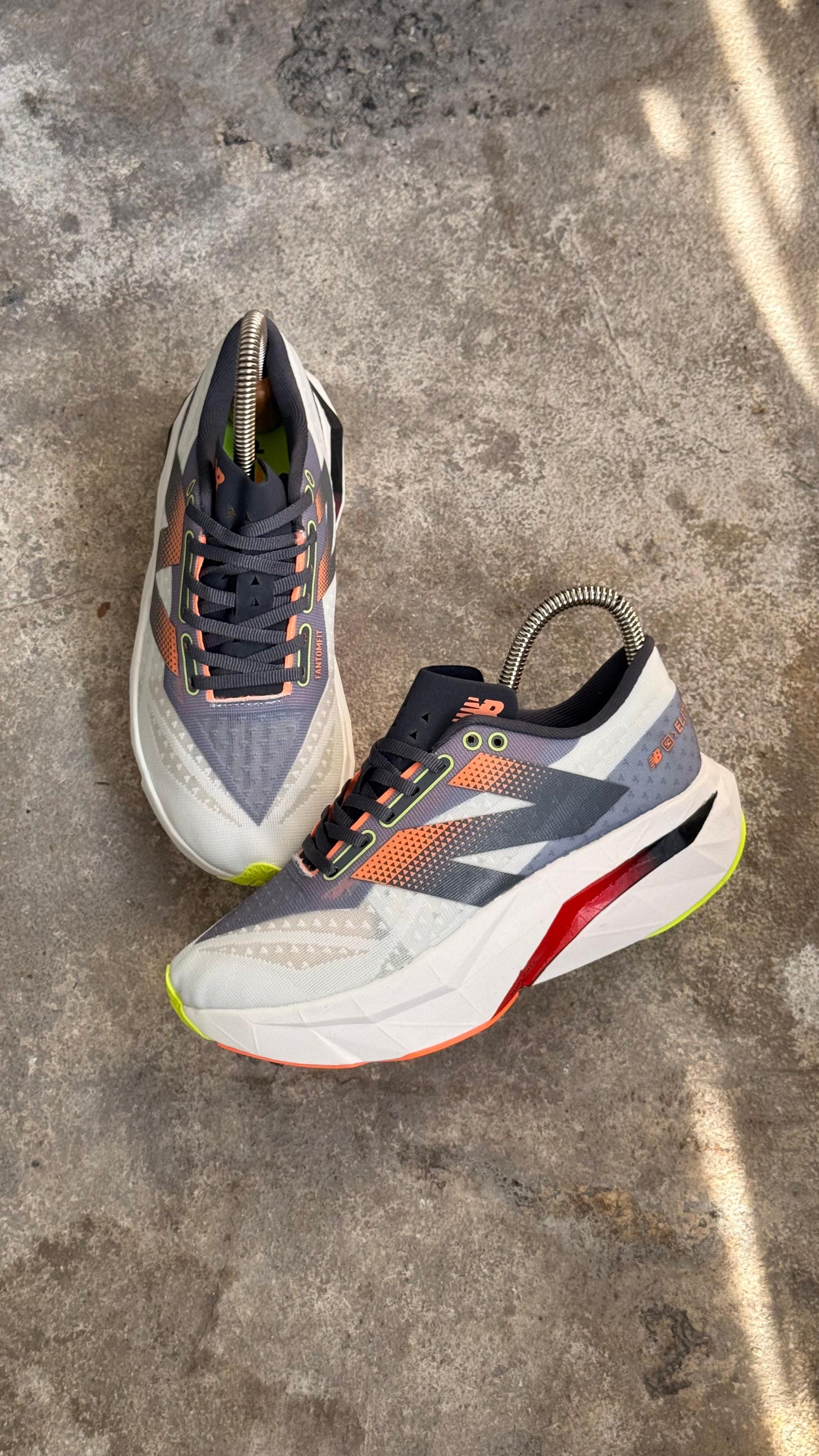 NEW BALANCE ELITE GRIS ROJO