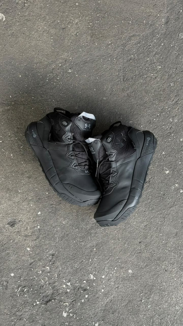 BOTA UNDER NEGRA CUERO SINTETICO