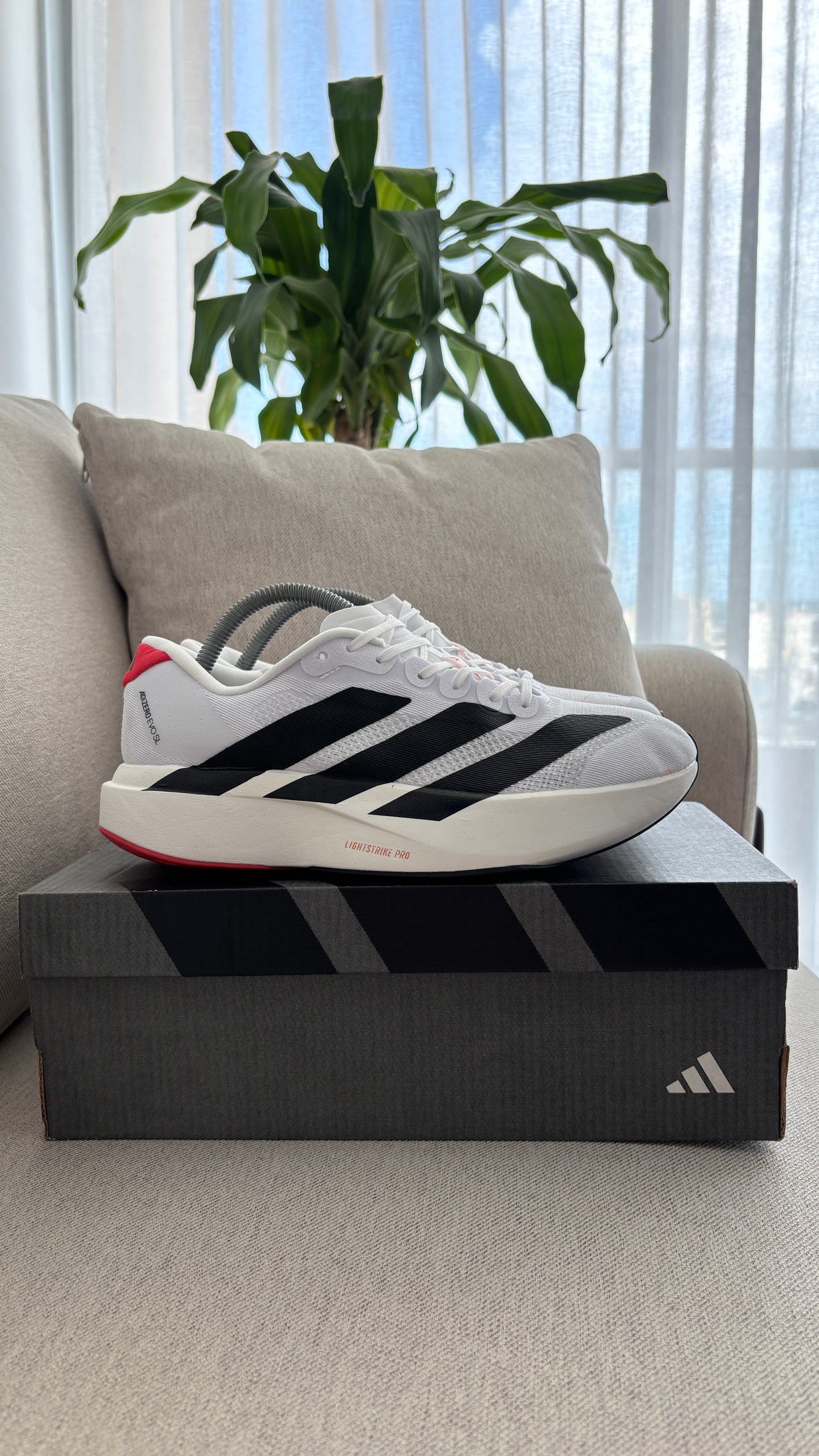 ADIZERO BLANCO NEGRO ROJO
