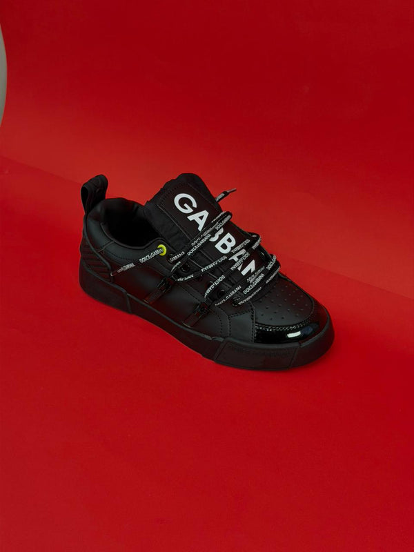 DOLCE GABBANA ZAPATILLA CORDÓN NEGRO