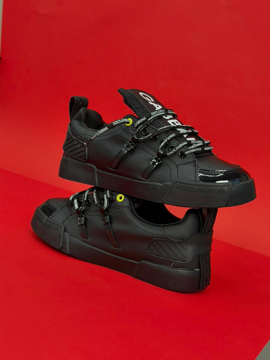 DOLCE GABBANA ZAPATILLA CORDÓN NEGRO