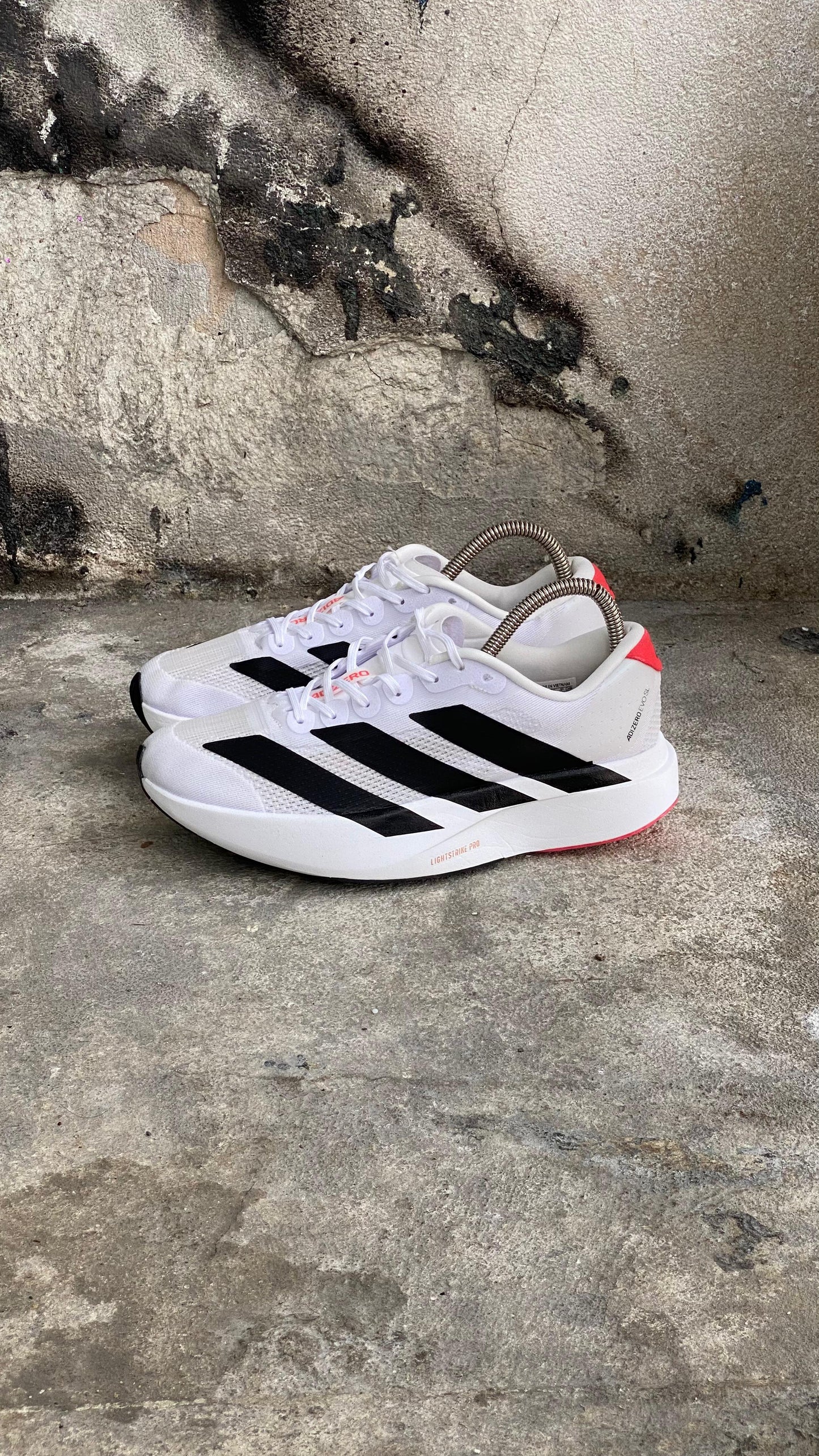 ADIZERO BLANCO NEGRO ROJO