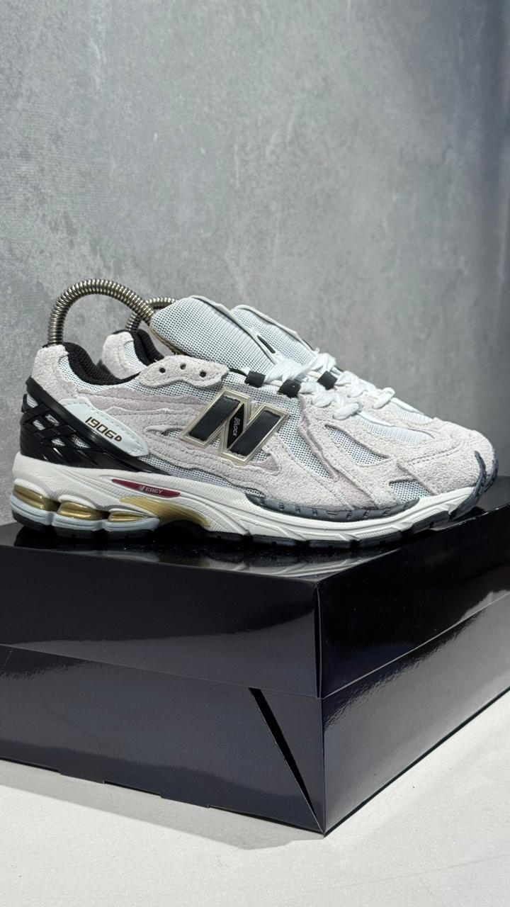 NEW BALANCE 1908 GRIS DORADO