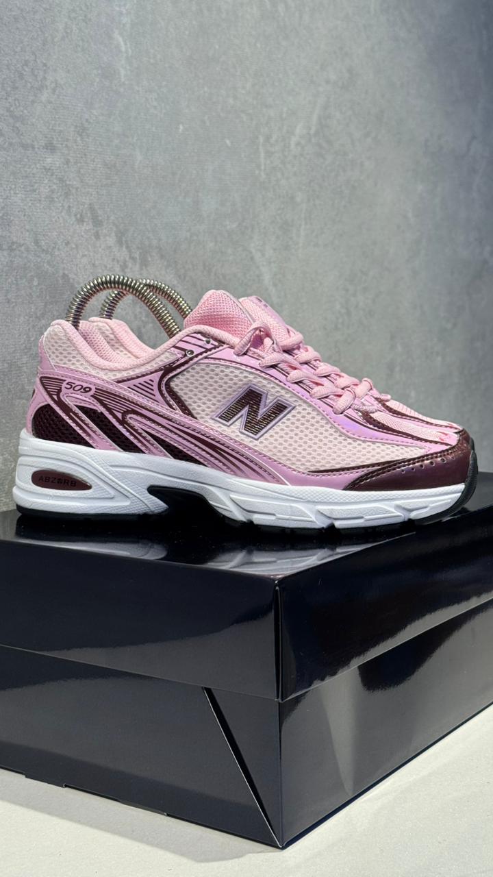 NEW BALANCE 509 ROSADO