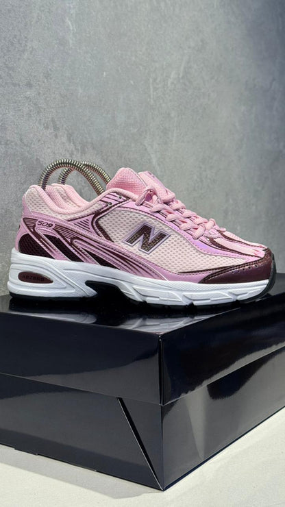 NEW BALANCE 509 ROSADO
