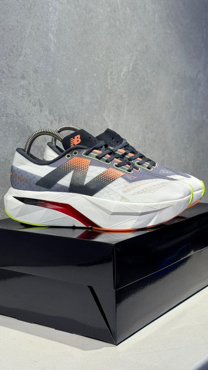 NEW BALANCE ELITE GRIS ROJO