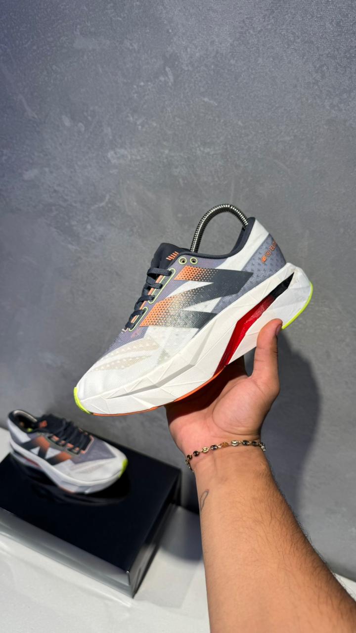 NEW BALANCE ELITE GRIS ROJO