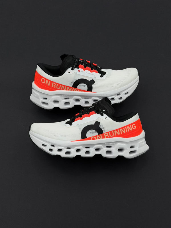 ON RUNNING BLANCO LINEA NARANJA