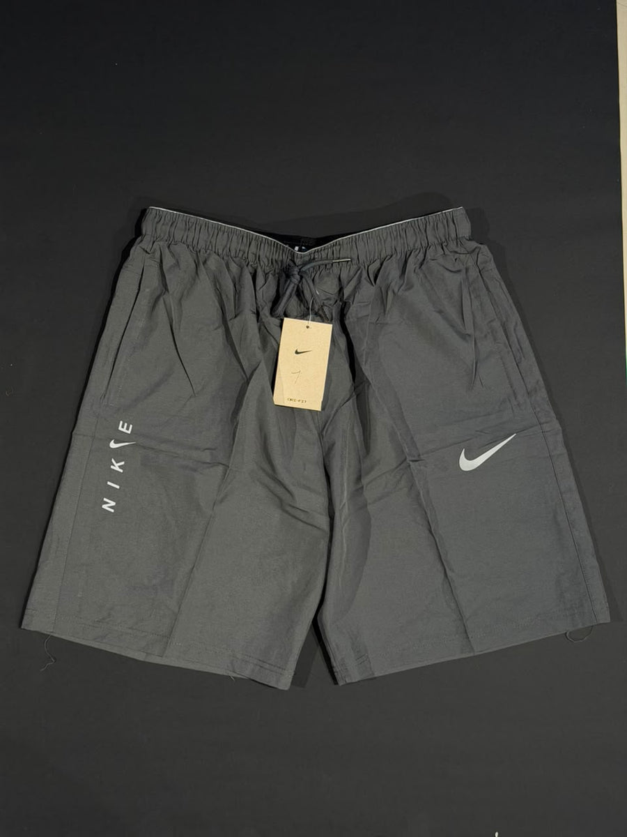 PANTALONETA DEPORTIVA NIKE GRIS OSCURO