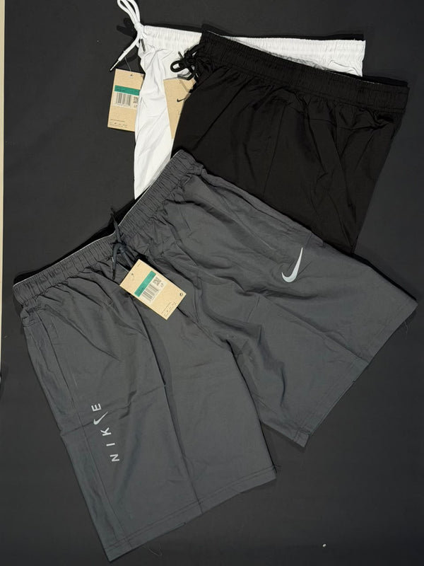 PANTALONETA DEPORTIVA NIKE GRIS OSCURO