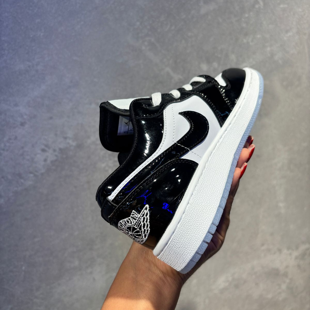 NIKE RETRO 1 LOW NEGRA AZUL